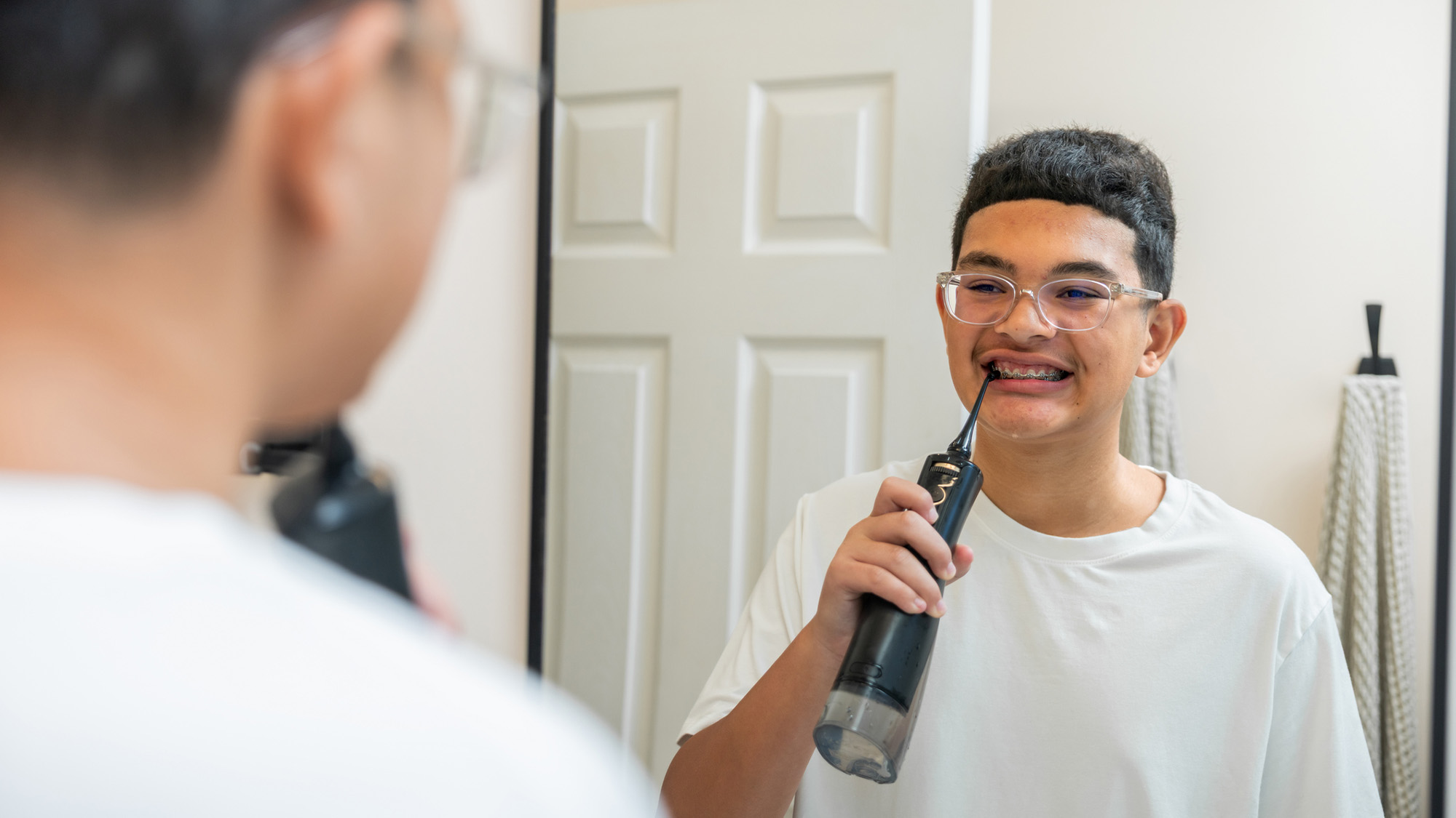 Do water picks really work? Dentists weigh in.