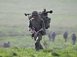 Labour accused of 'dithering' over war footing bill: Plans to bolster UK's defence are delayed until next year despite widespread conflict