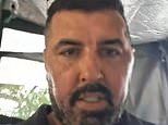 British career gangster Sam Walker 'is arrested by undercover cops in Vietnam' as he shares clip of moment he's put into back of police van to his TikTok followers